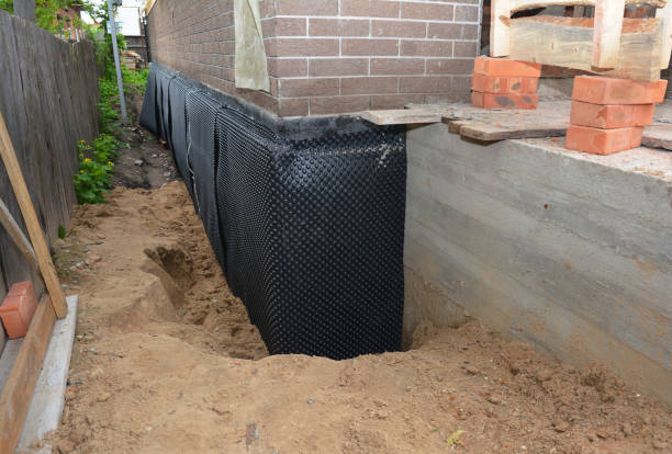 Happy homeowners after waterproofing job in West Long Branch